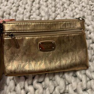 Michael Kors rose gold wristlet wallet